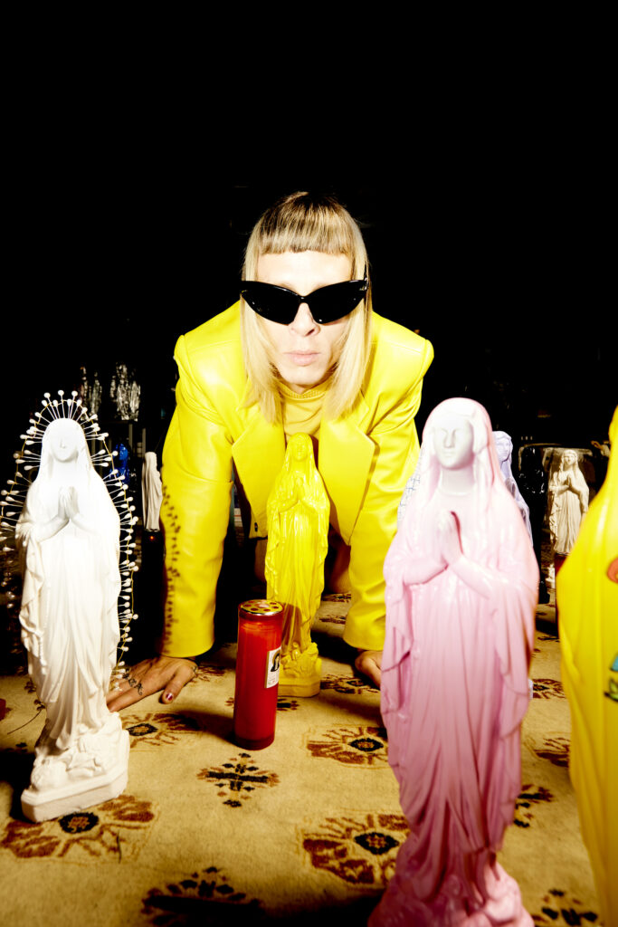 Total look Marni, sunglasses Gentle Monster, boots Dsquared2